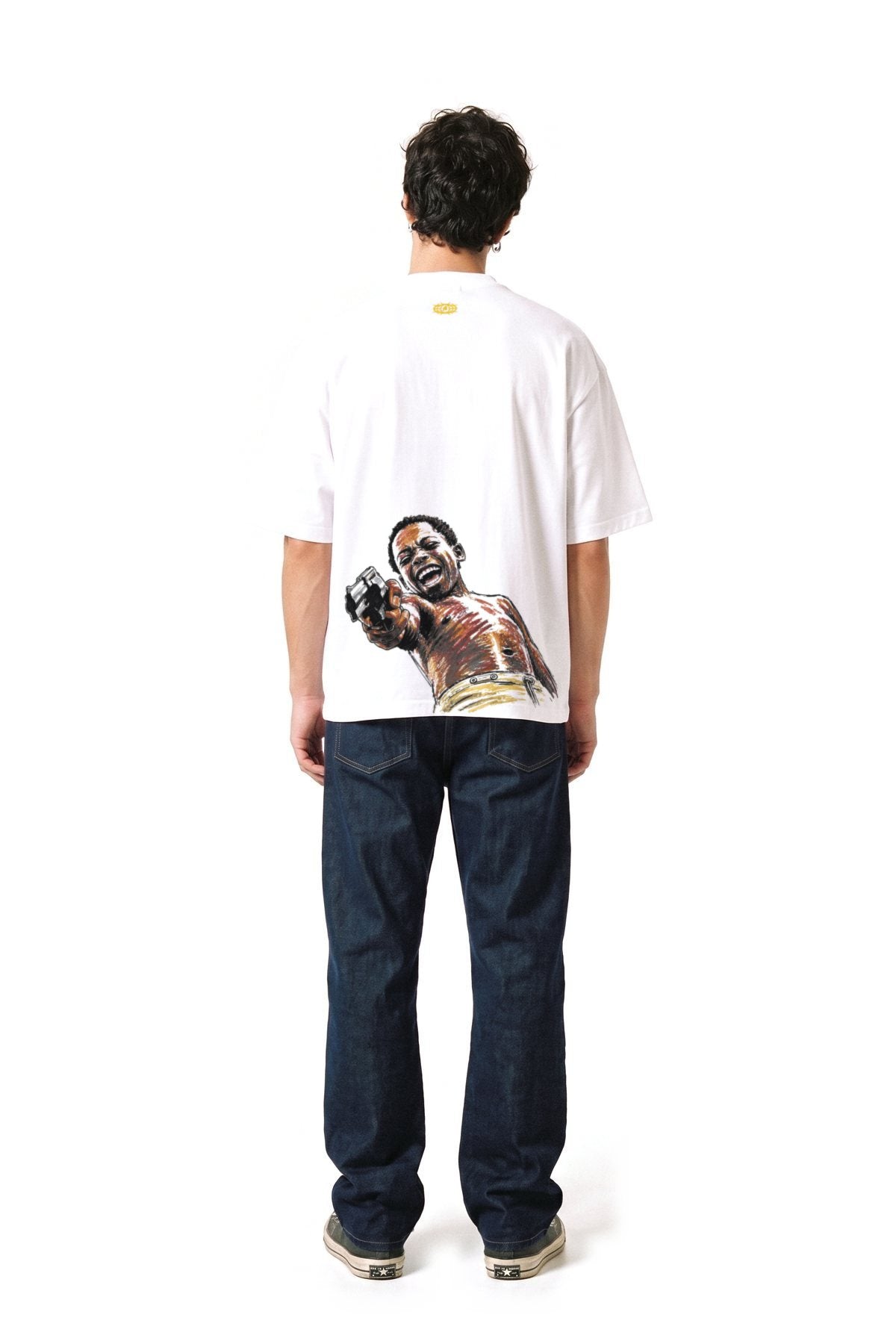 Dean wearing the God loves Rio t-shirt, back view