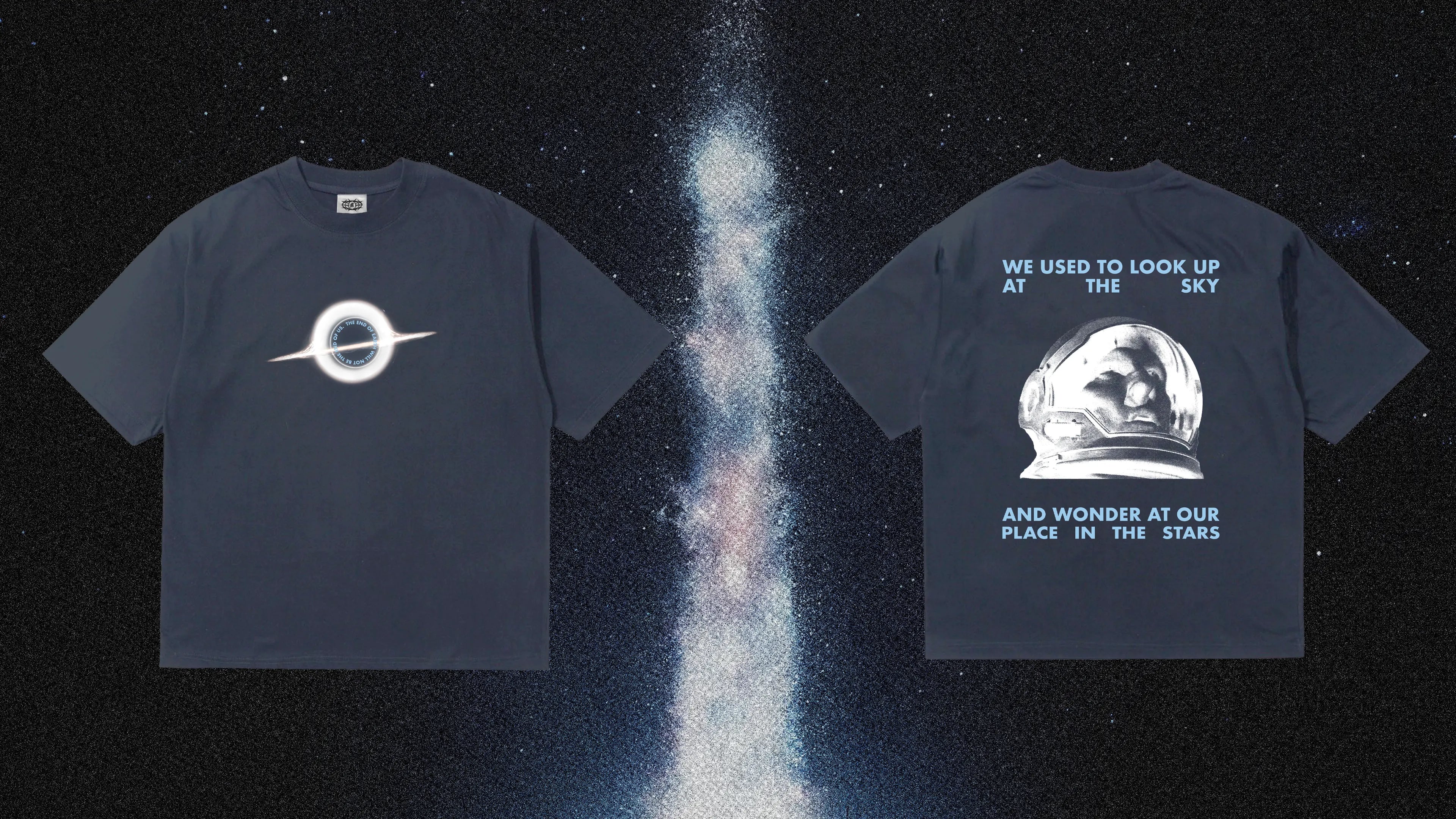 Navy blue t-shirt with Insterstellar movie space-themed designs on a starry background. T-shirt features Matthew McConnaughey looking at the stars in space suit.